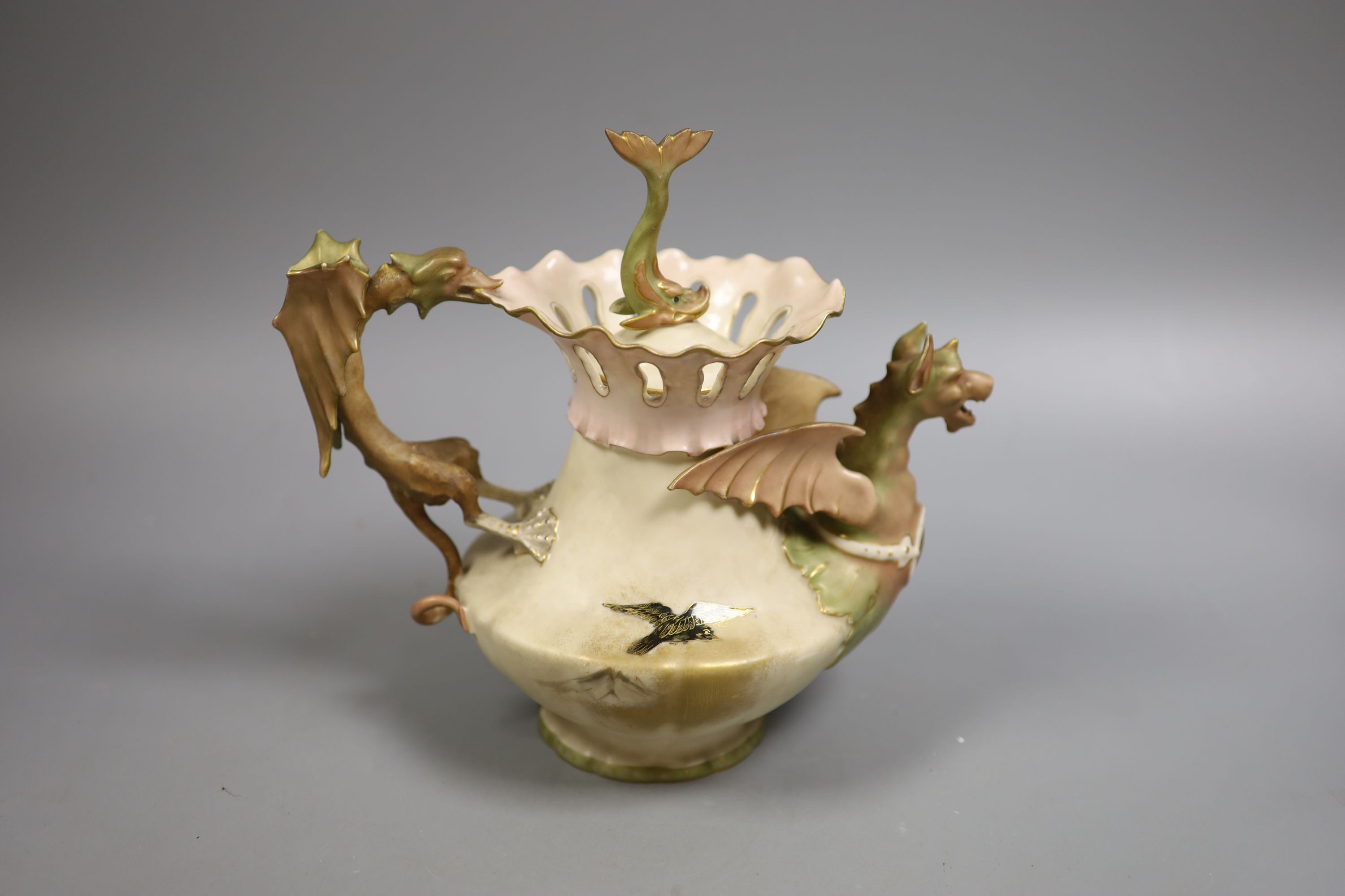 An Alfred Stellmacher Teplitz ‘dragon’ teapot and cover, c.1890, decorated with an owl, 23cm across